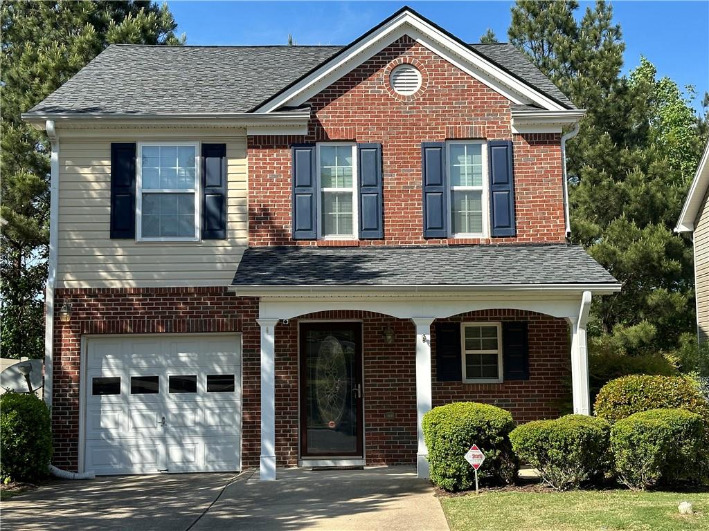 303 Silver Spring Street Dallas, GA 30157 - Photo 1 of 1 front view of a house with a yard