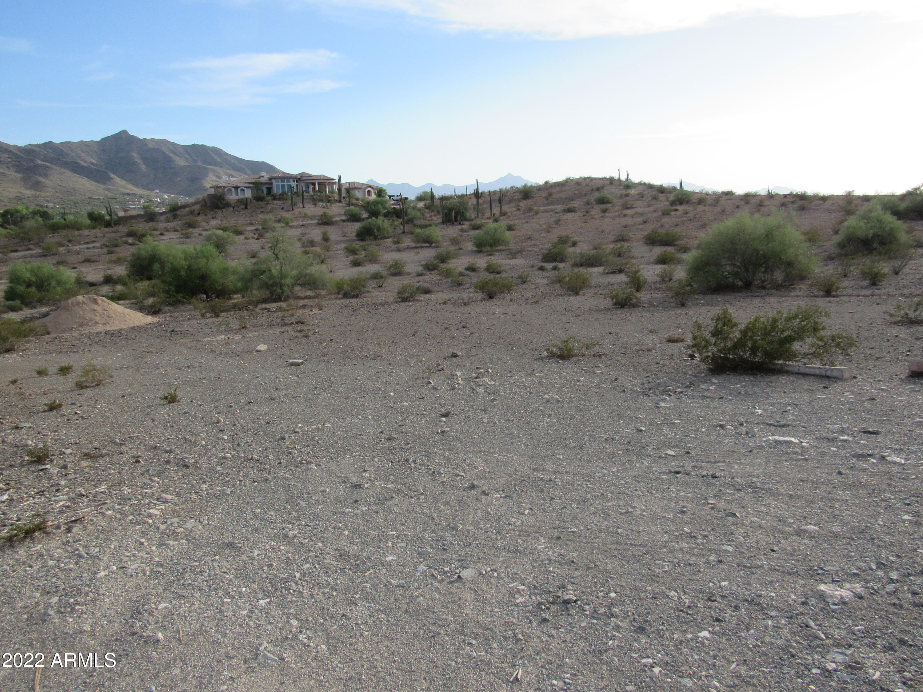 2211 West Dobbins Road, Unit A Phoenix, AZ 85041 - Photo 21 of 33 a view of a dry field with mountains in the background