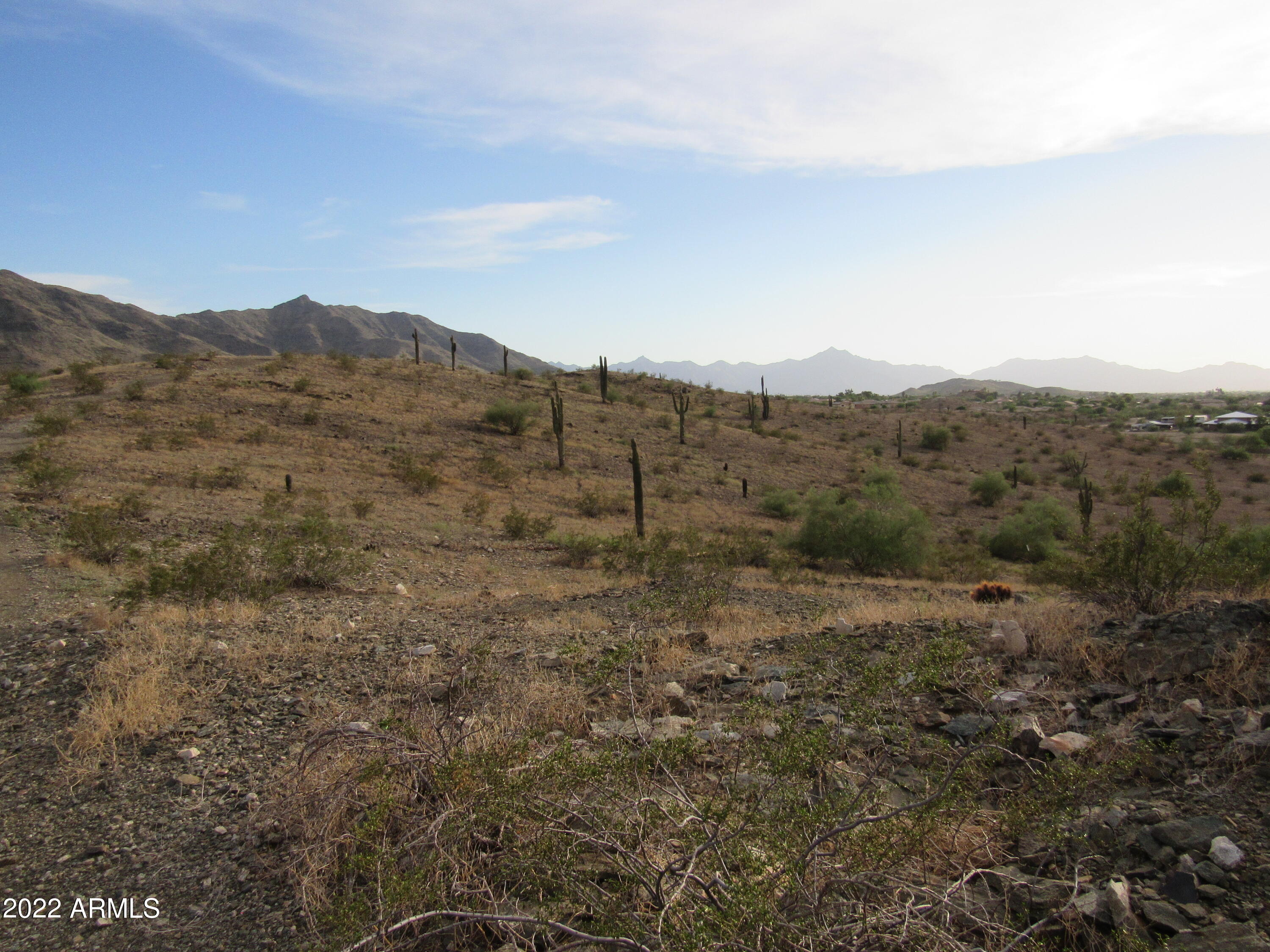 2211 West Dobbins Road, Unit A Phoenix, AZ 85041 - Photo 22 of 33 a view of a dry field with mountains in the background