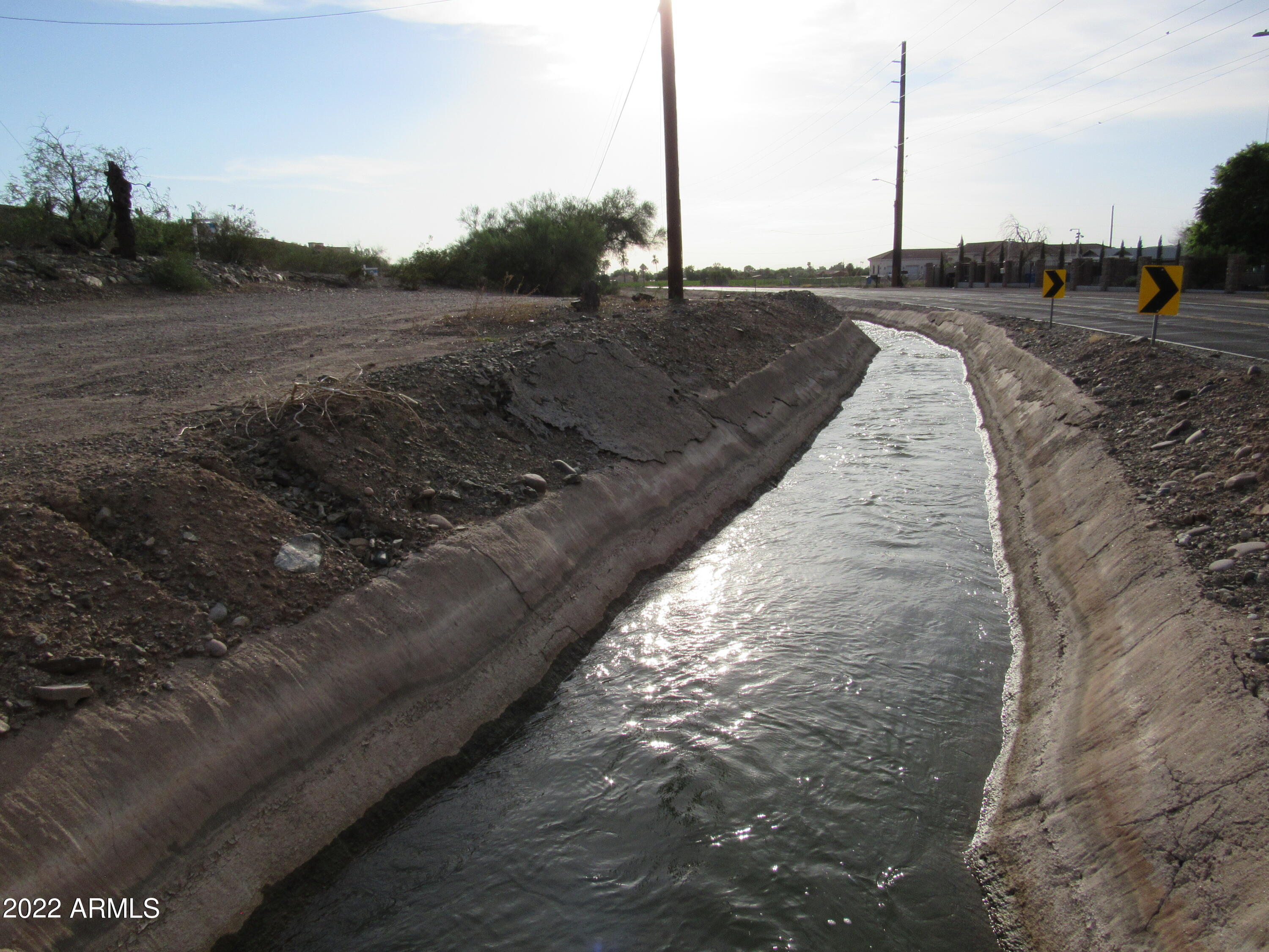 2211 West Dobbins Road, Unit A Phoenix, AZ 85041 - Photo 32 of 33 a view of a dry yard with wooden fence