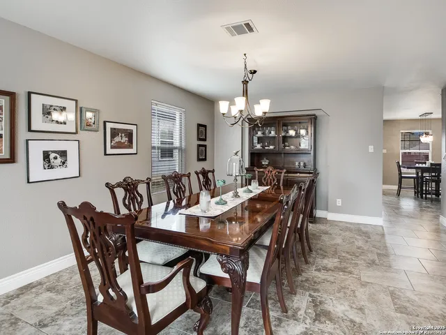 a view of a dining room with furniture