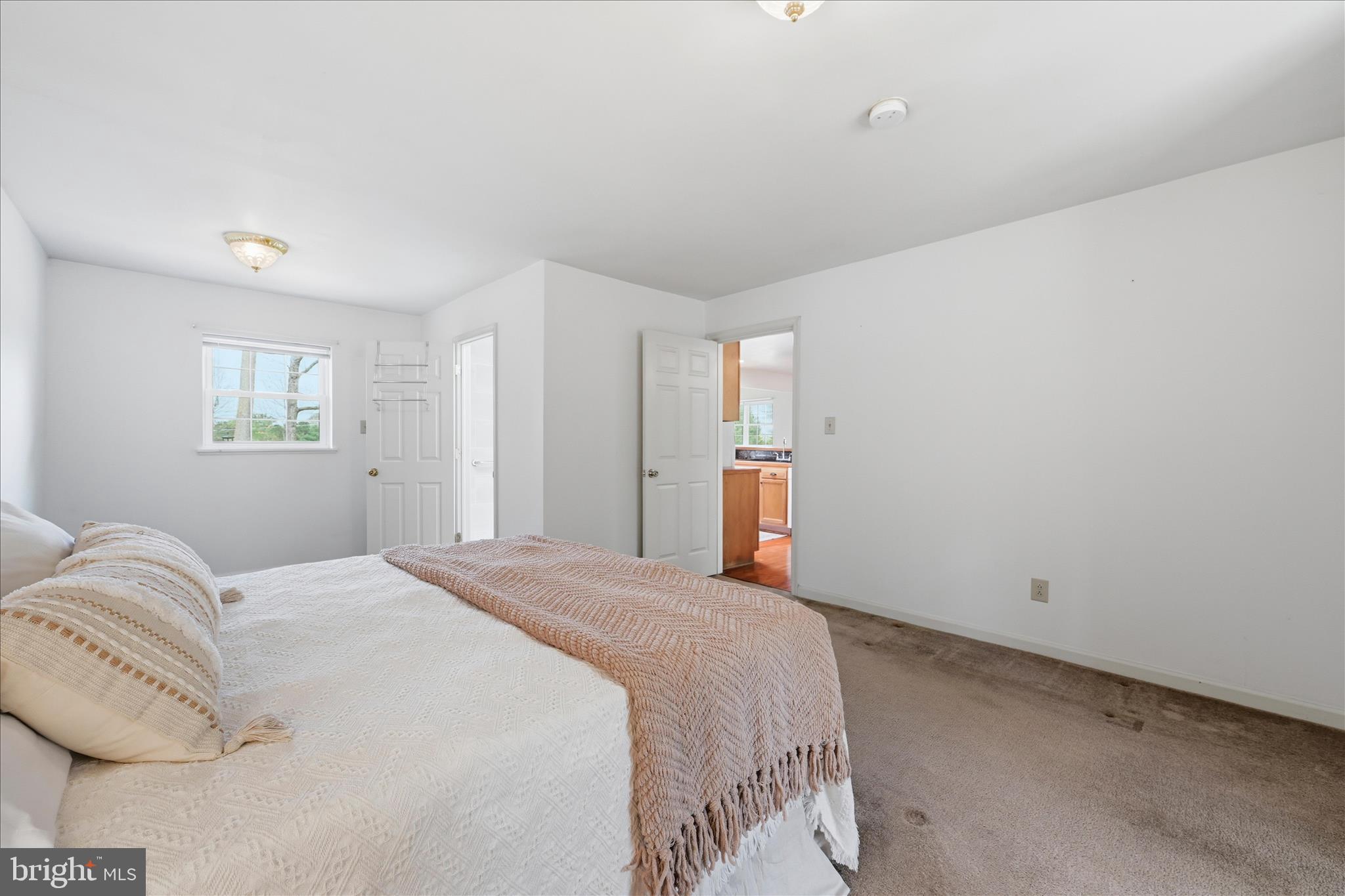 1988 Chestnut Hill Road Mohnton, PA 19540 - Photo 17 of 33 a spacious bedroom with a bed and a window