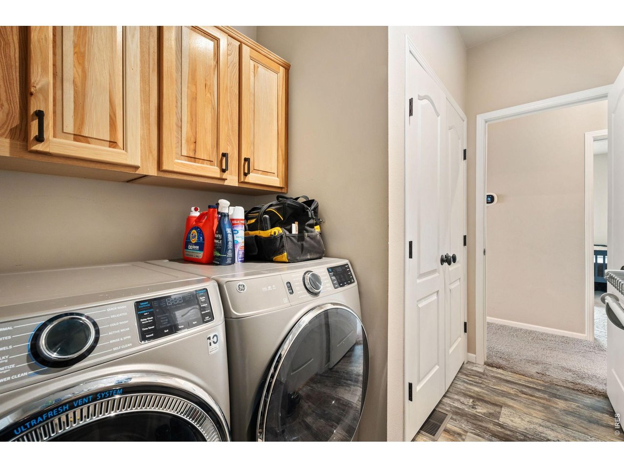 62 Rabbit Ears Court Livermore, CO 80536 - Photo 13 of 36 a utility room with dryer and washer