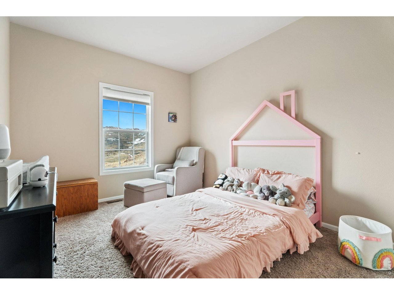 62 Rabbit Ears Court Livermore, CO 80536 - Photo 19 of 36 a bedroom with a bed and a window