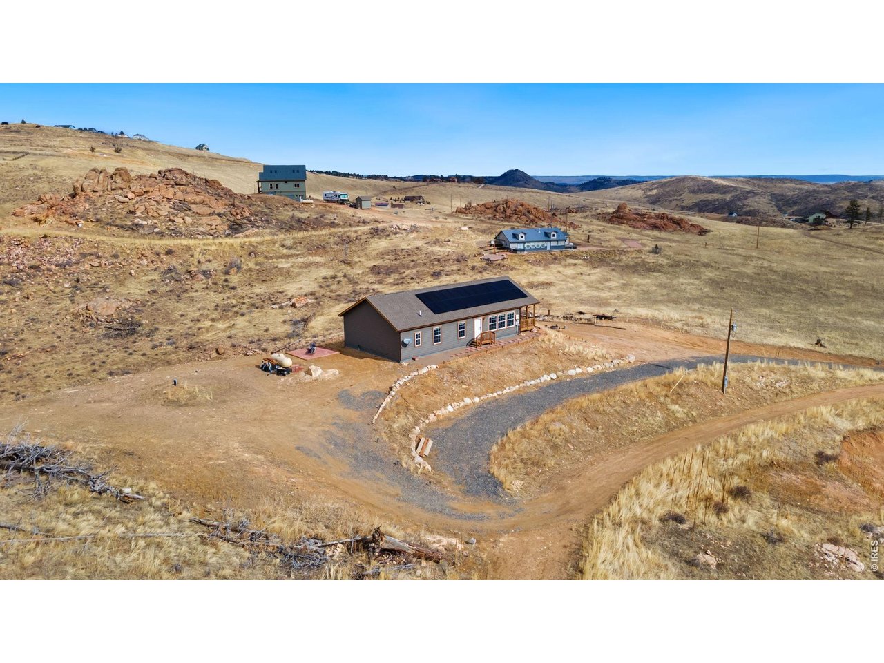 62 Rabbit Ears Court Livermore, CO 80536 - Photo 31 of 36 a black and white photo of a beach