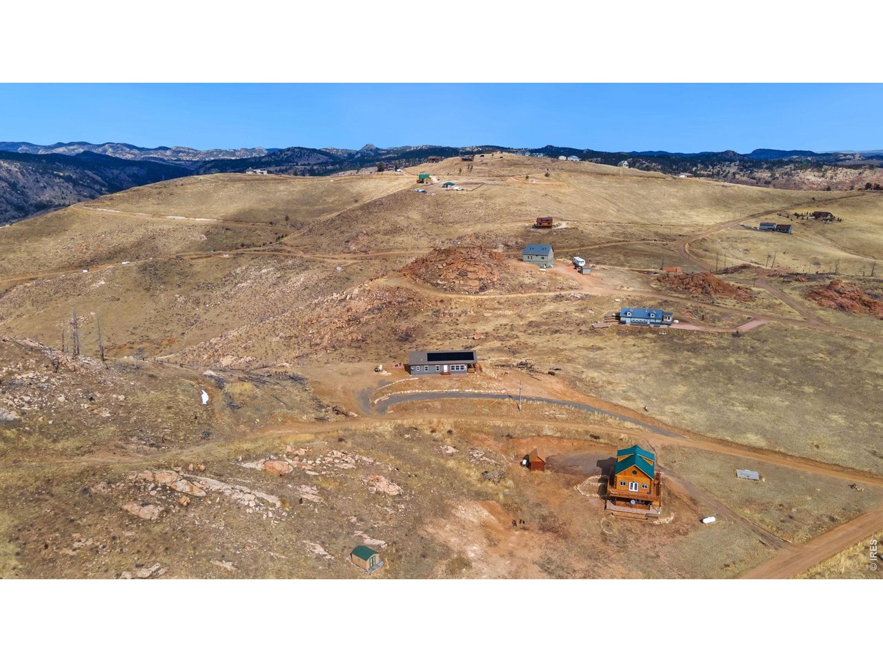 62 Rabbit Ears Court Livermore, CO 80536 - Photo 32 of 36 a black and white photo of a beach