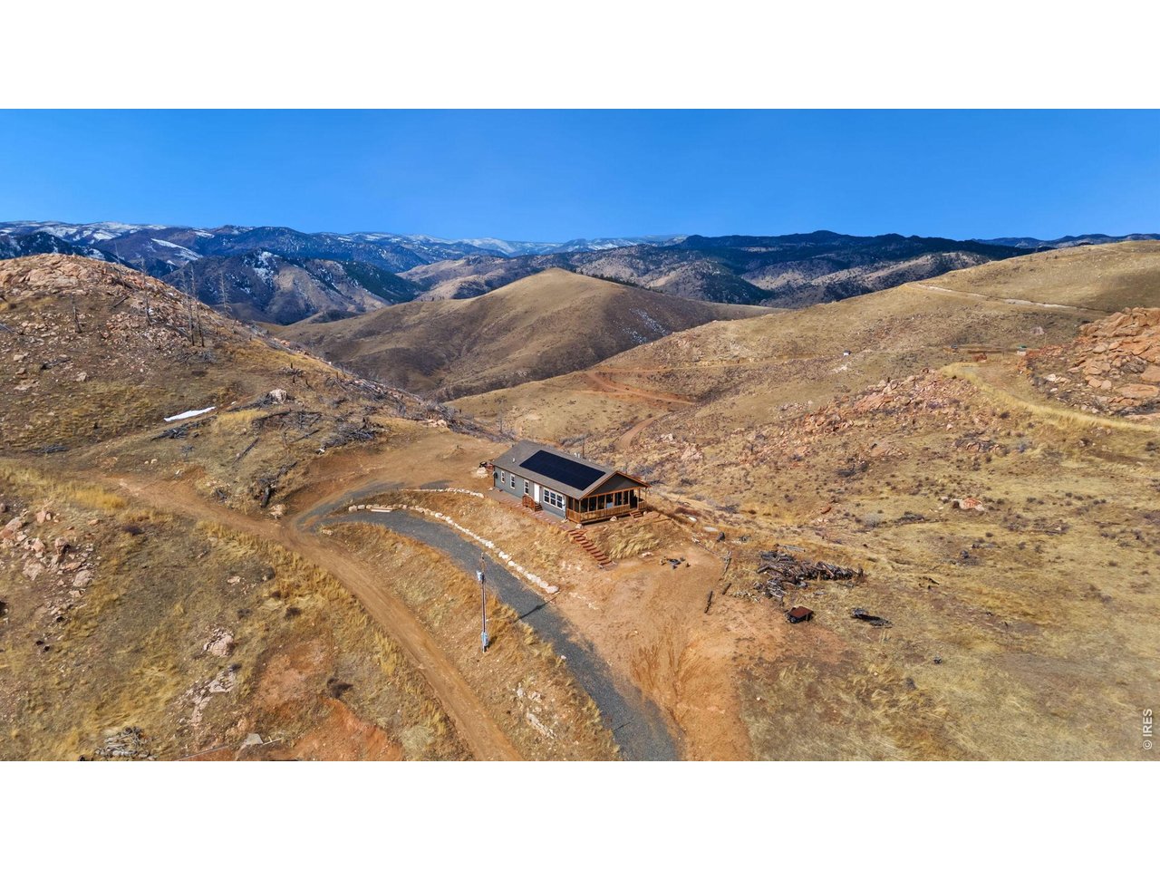 62 Rabbit Ears Court Livermore, CO 80536 - Photo 33 of 36 a open area with trees in the background