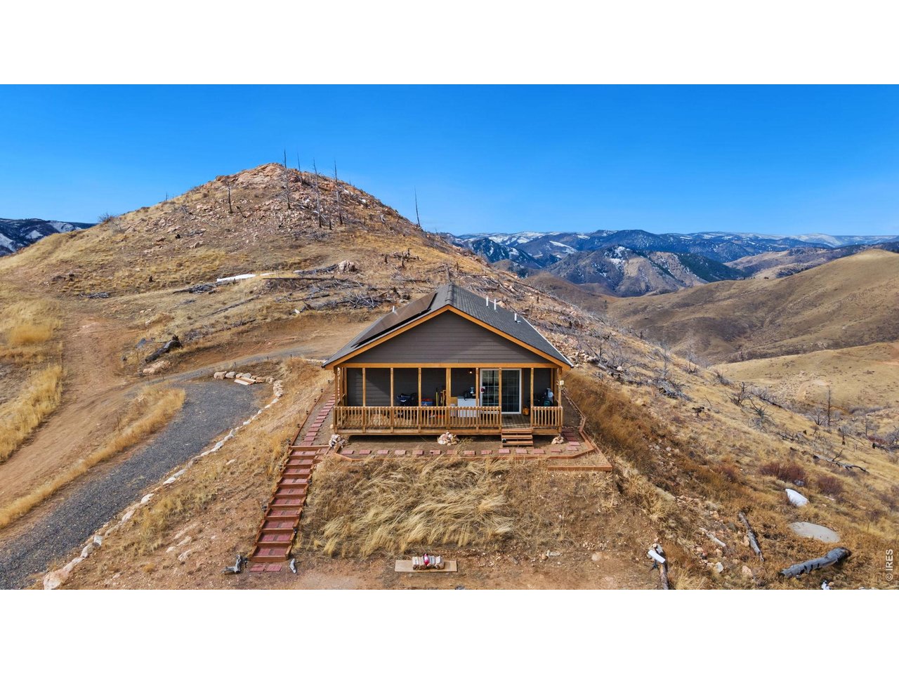 62 Rabbit Ears Court Livermore, CO 80536 - Photo 34 of 36 a black and white photo of a house