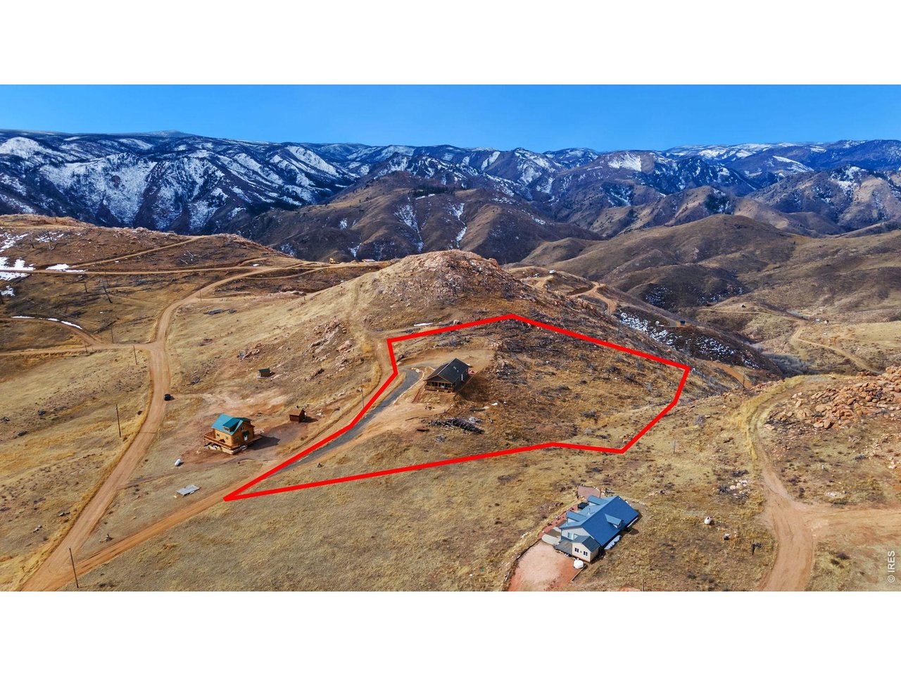 62 Rabbit Ears Court Livermore, CO 80536 - Photo 35 of 36 a black and white photo of a house