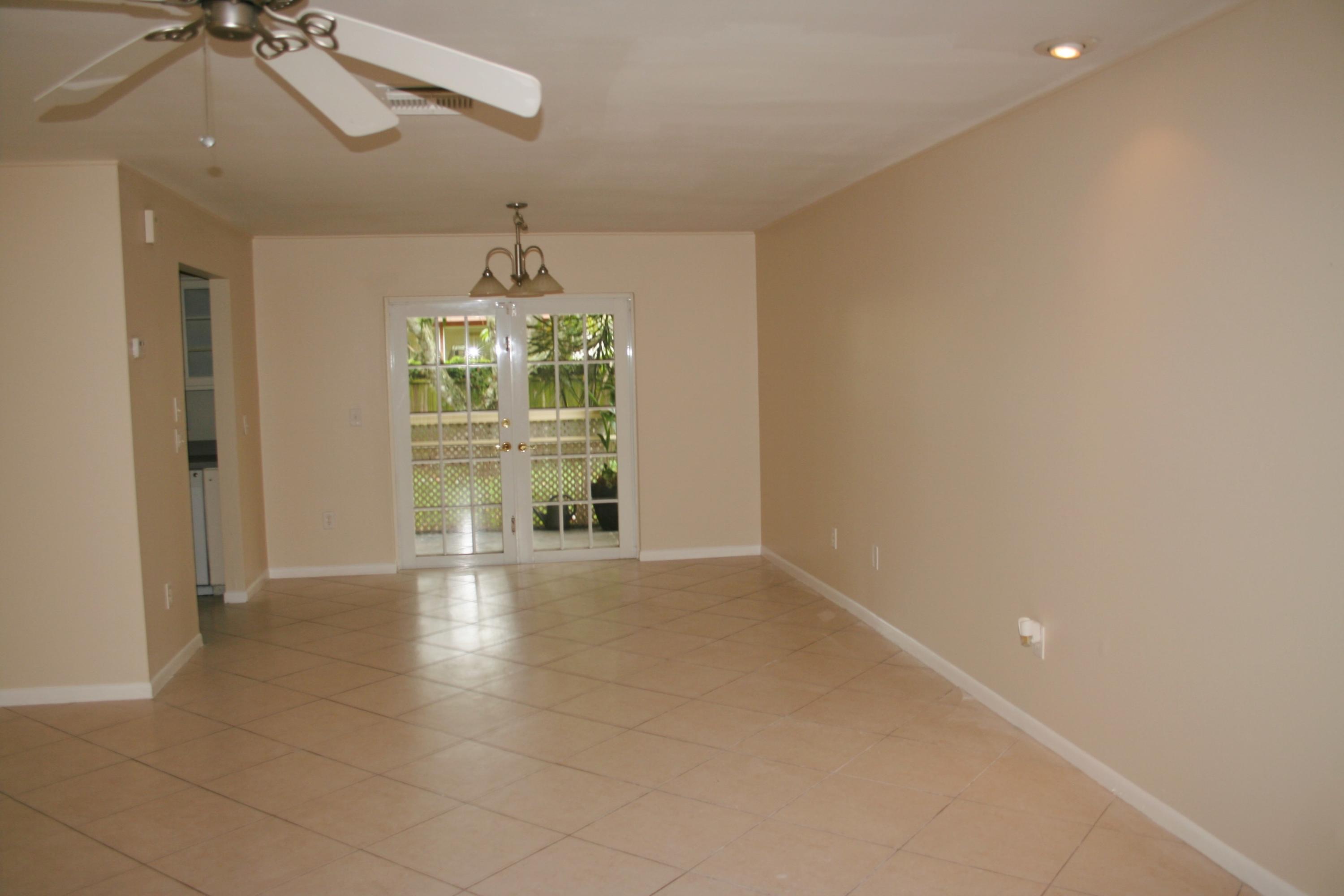 22676 Southwest 65th Terrace Boca Raton, FL 33428 - Photo 2 of 12 a view of an empty room with a window