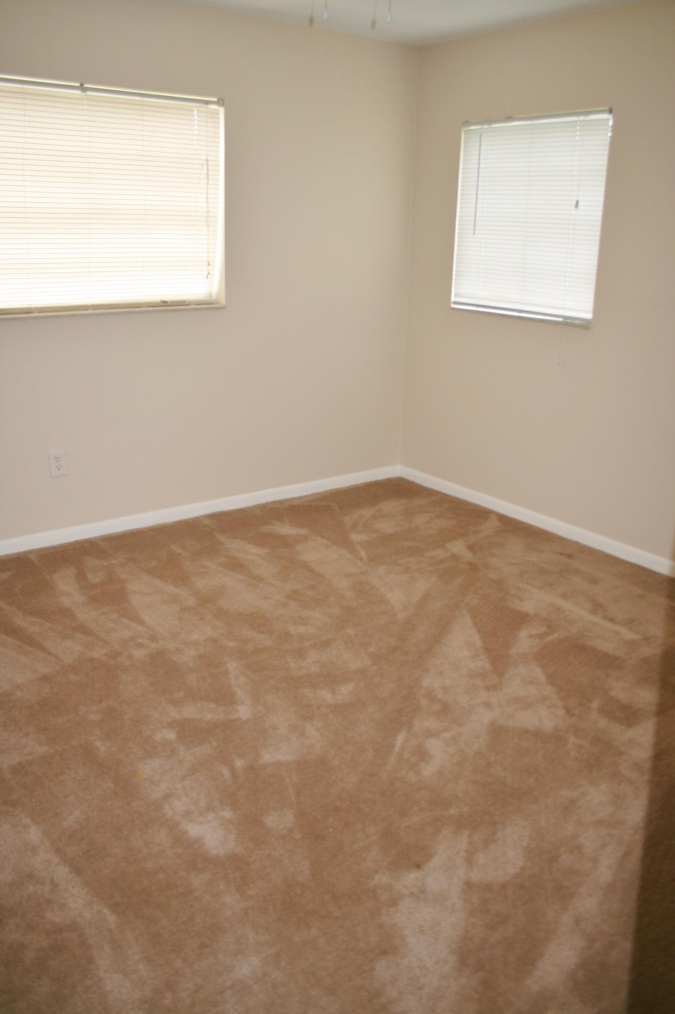 22676 Southwest 65th Terrace Boca Raton, FL 33428 - Photo 7 of 12 an empty room with a window