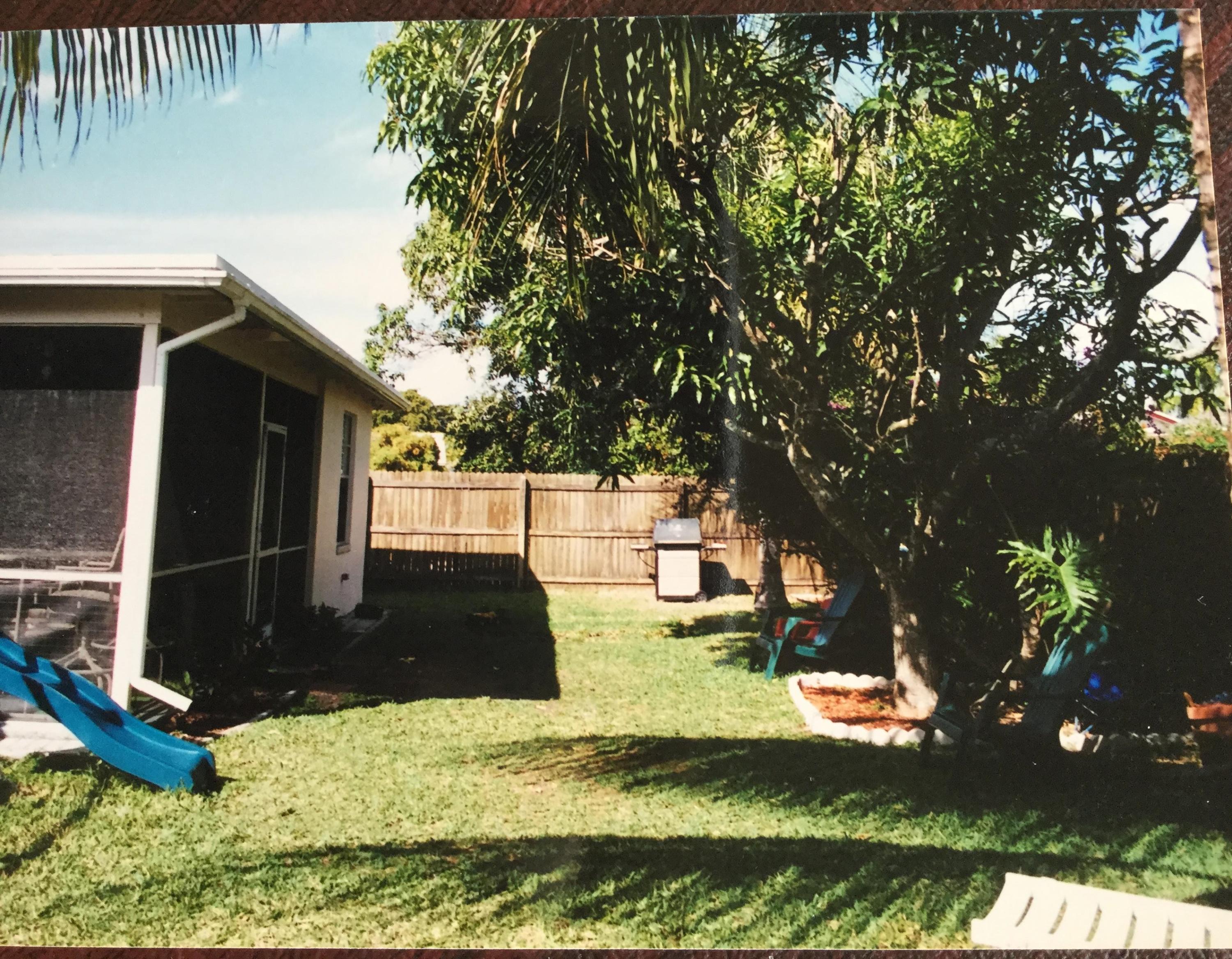 22676 Southwest 65th Terrace Boca Raton, FL 33428 - Photo 9 of 12 a view of a backyard