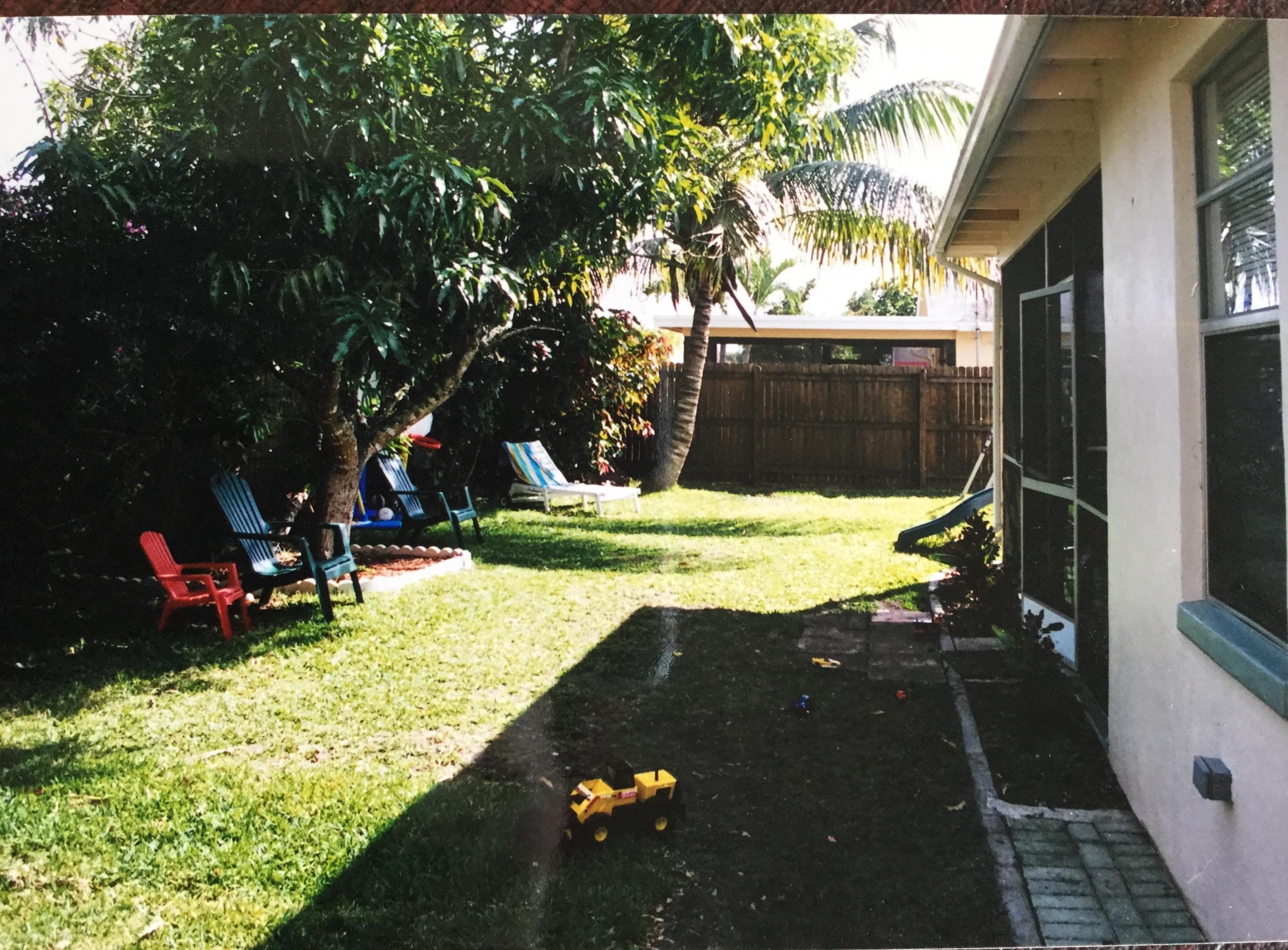 22676 Southwest 65th Terrace Boca Raton, FL 33428 - Photo 10 of 12 a view of swimming pool with a bench and trees