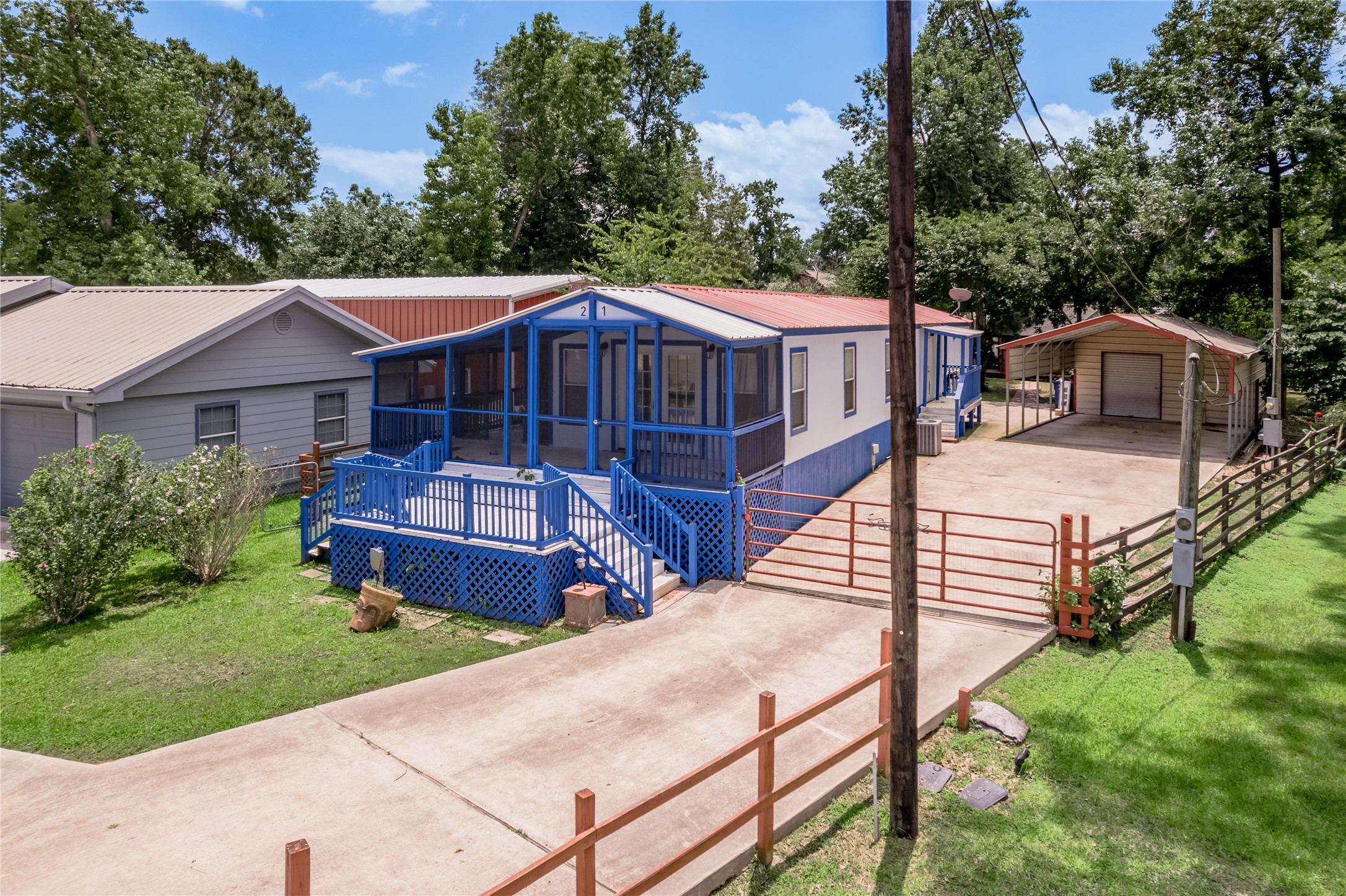 21 Oahu Court Point Blank, TX 77364 - Photo 7 of 45 Gated drive for extra security and privacy