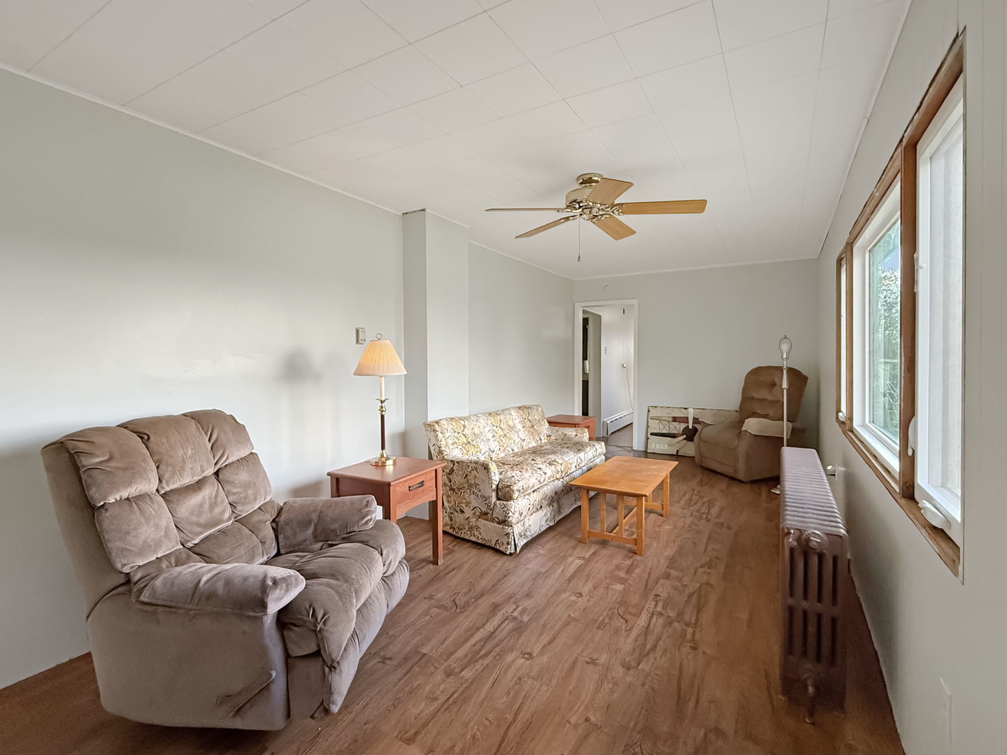 372 North 2629th Road Oglesby, IL 61348 - Photo 12 of 22 a living room with furniture two couches and a large window