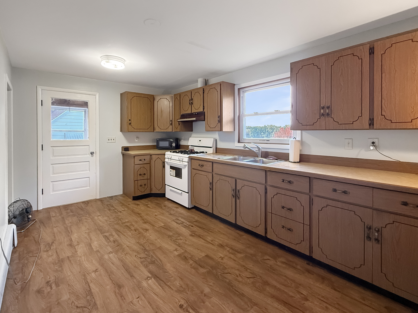 372 North 2629th Road Oglesby, IL 61348 - Photo 15 of 22 a kitchen with a sink cabinets and window