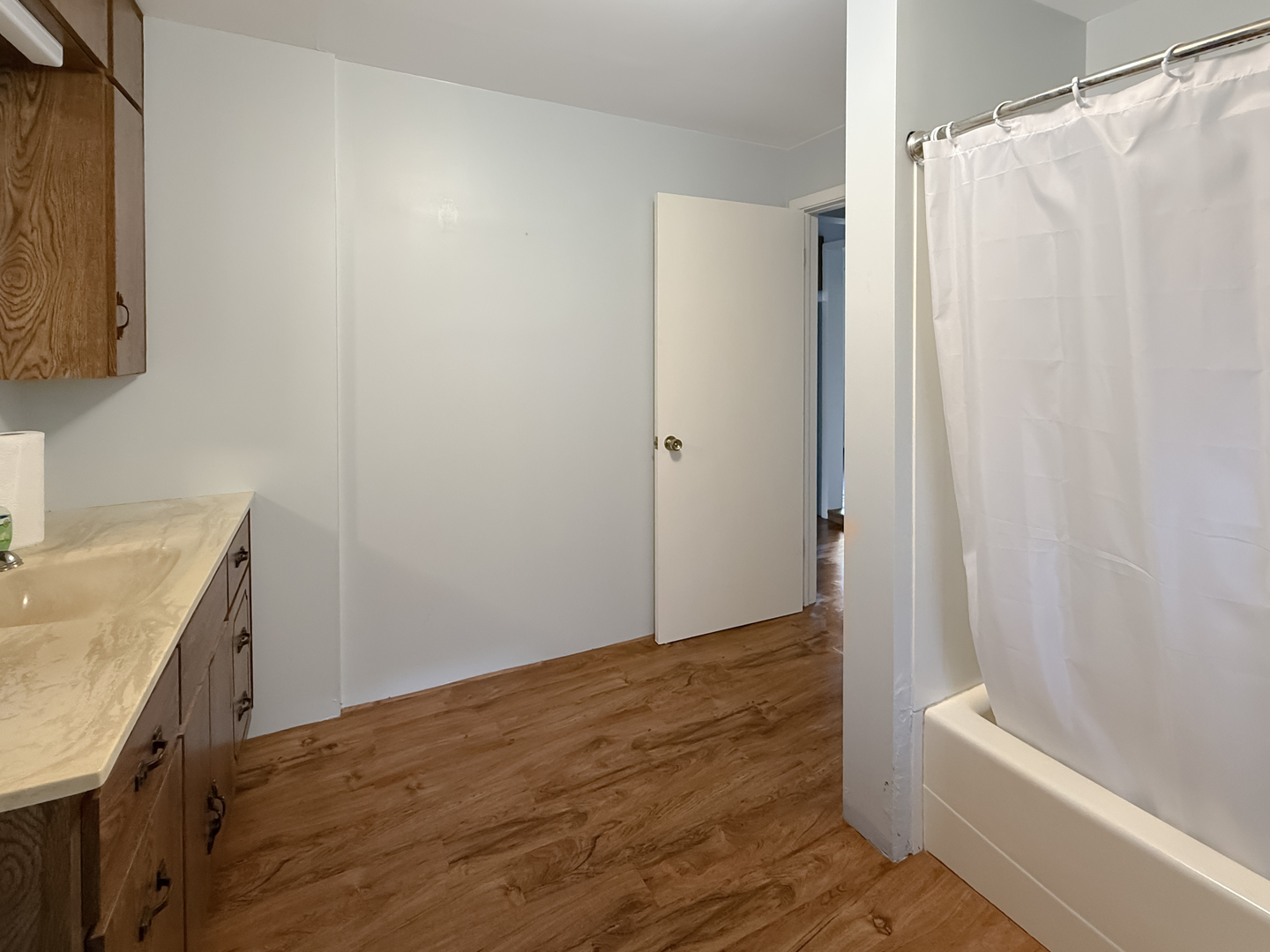 372 North 2629th Road Oglesby, IL 61348 - Photo 22 of 22 a bathroom with a granite countertop sink and a bathtub
