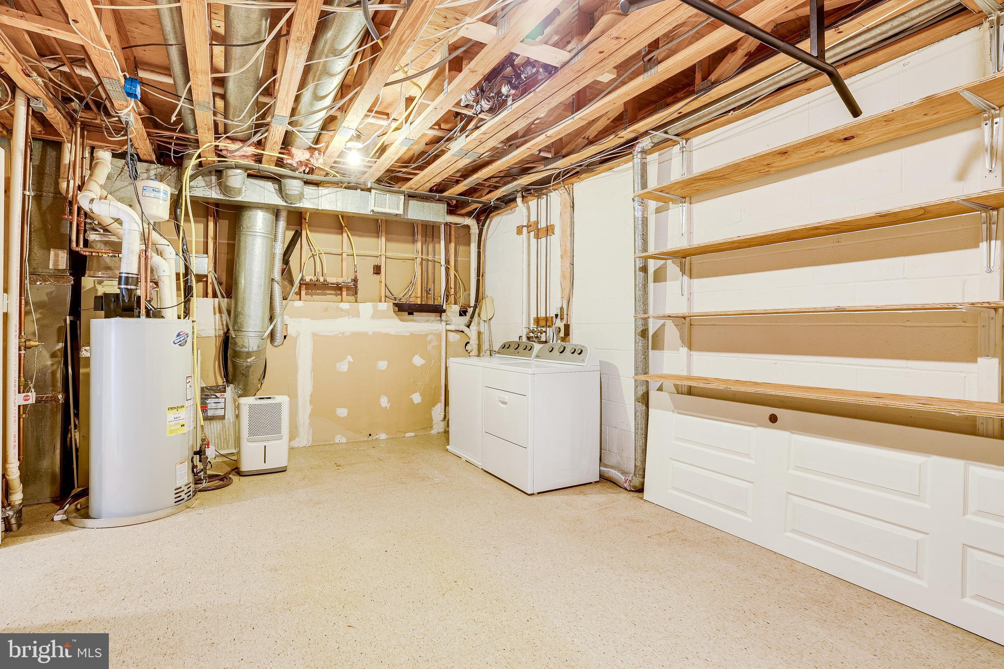 11056 Thrush Ridge Road Reston, VA 20191 - Photo 44 of 62 a utility room with dryer and washer