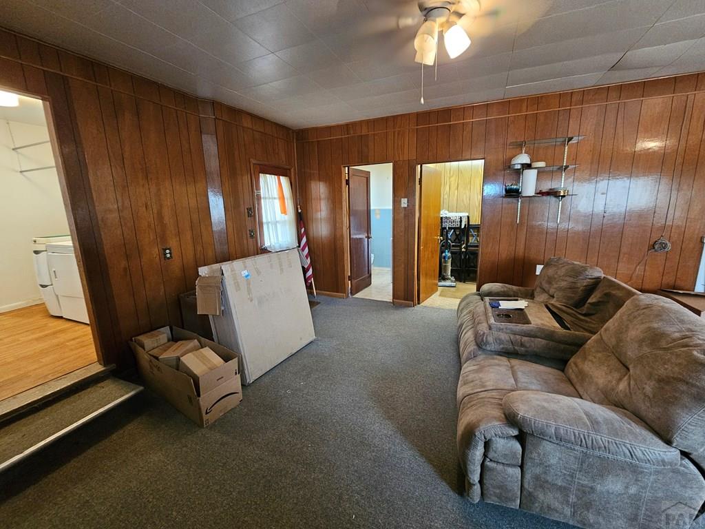 900 Rittgers Street Eads, CO 81036 - Photo 23 of 35 a living room with furniture and wooden floor