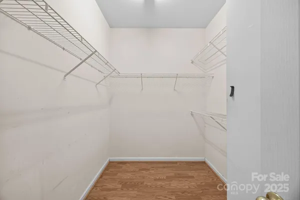 a view of a room with racks on the wall