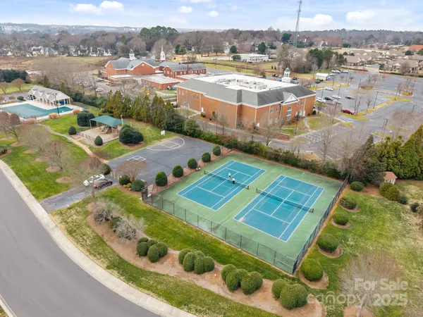 an aerial view of a house with a garden