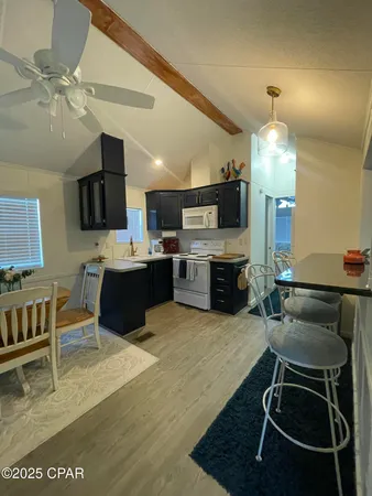 $254,900 | 1219 Thomas Drive, Unit 203, Panama City Beach, FL 32408