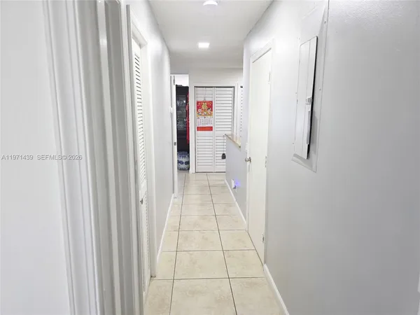 a view of hallway with stairs