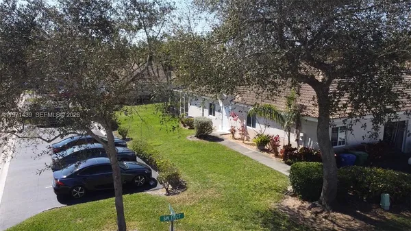 a view of yard with tree s