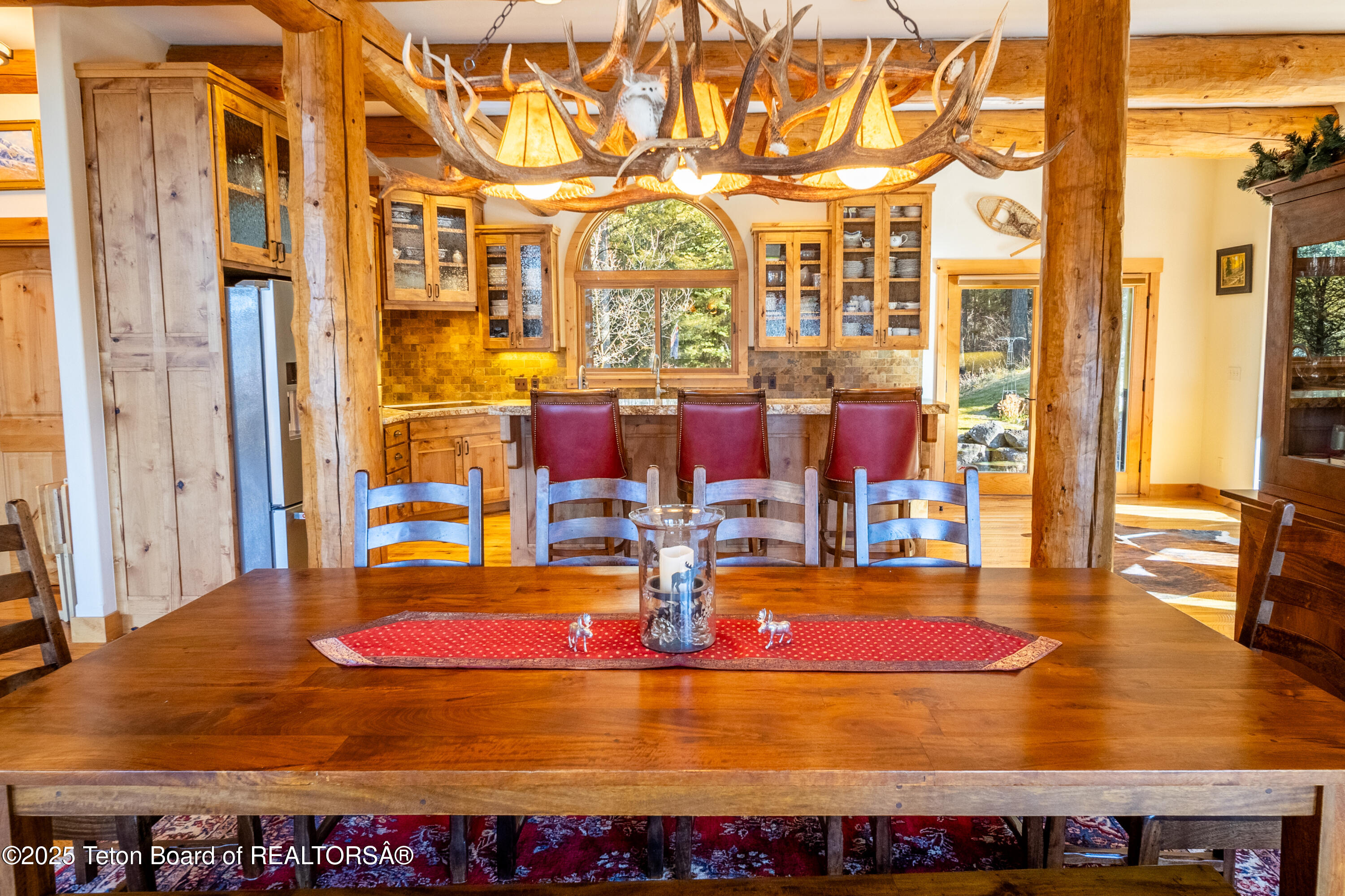 1558 Trail Ridge Road Alpine, WY 83128 - Photo 14 of 45 Dining Room to Kitchen