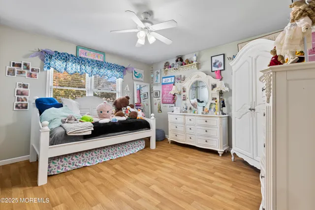 a bedroom with furniture and a bed