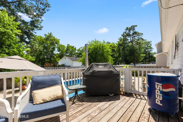 a balcony view with a seating space