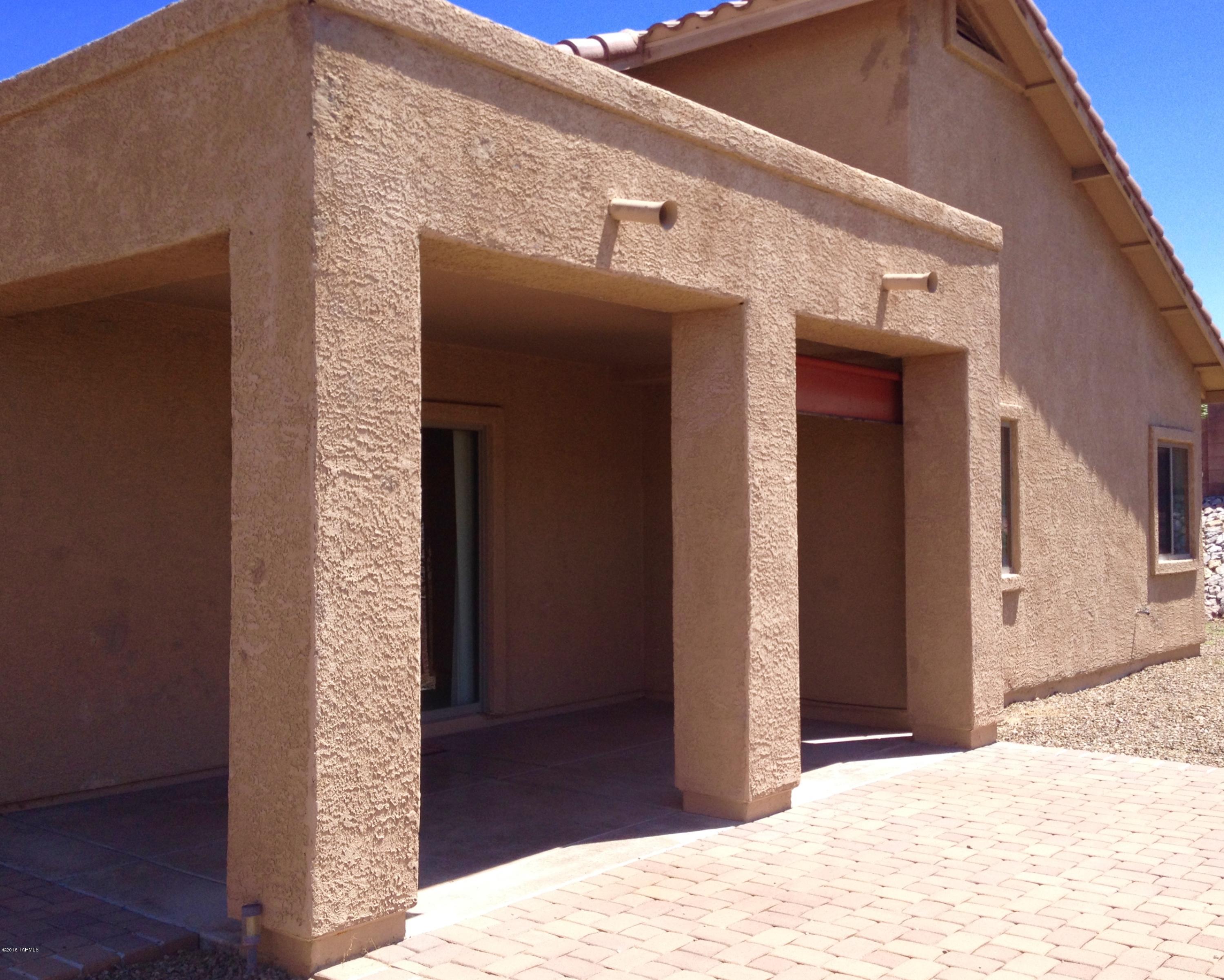 7931 North Iron Ridge Drive Tucson, AZ 85743 - Photo 17 of 21 a view of entryway front of house
