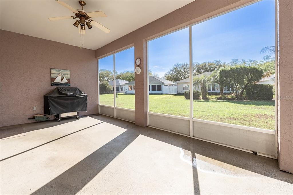 9077 Southwest 95th Terrace Ocala, FL 34481 - Photo 34 of 45 a living room with a large window