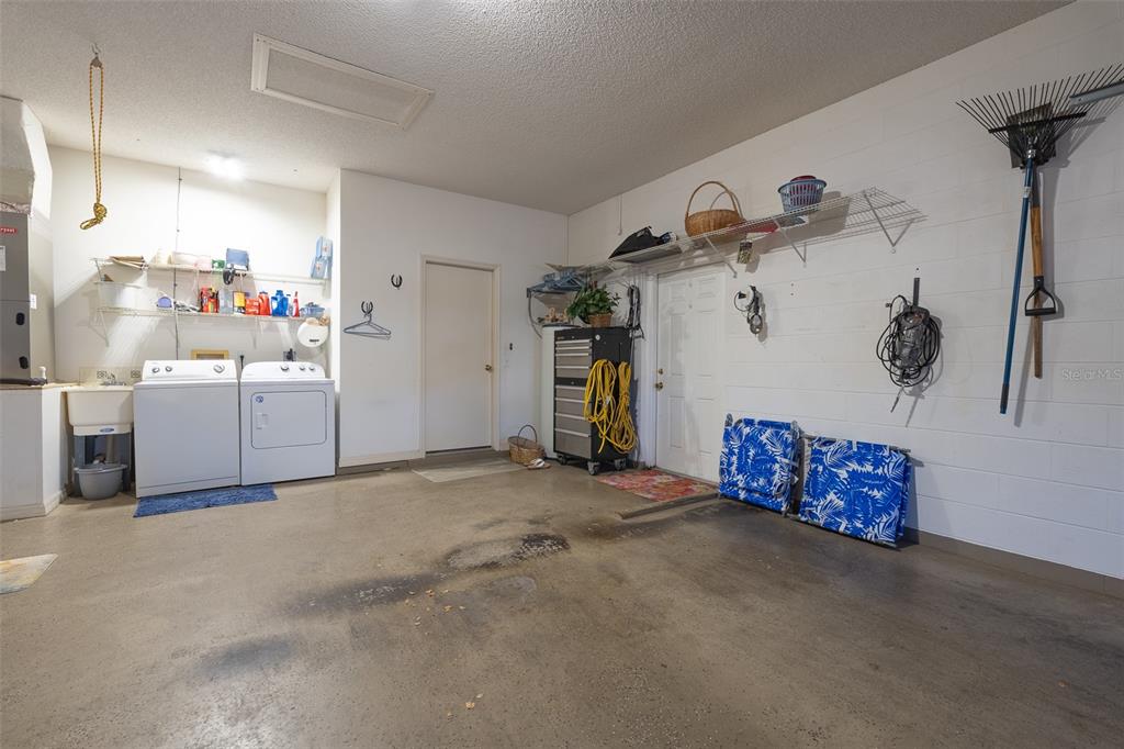 9077 Southwest 95th Terrace Ocala, FL 34481 - Photo 38 of 45 a view of a storage & utility room with closet fan