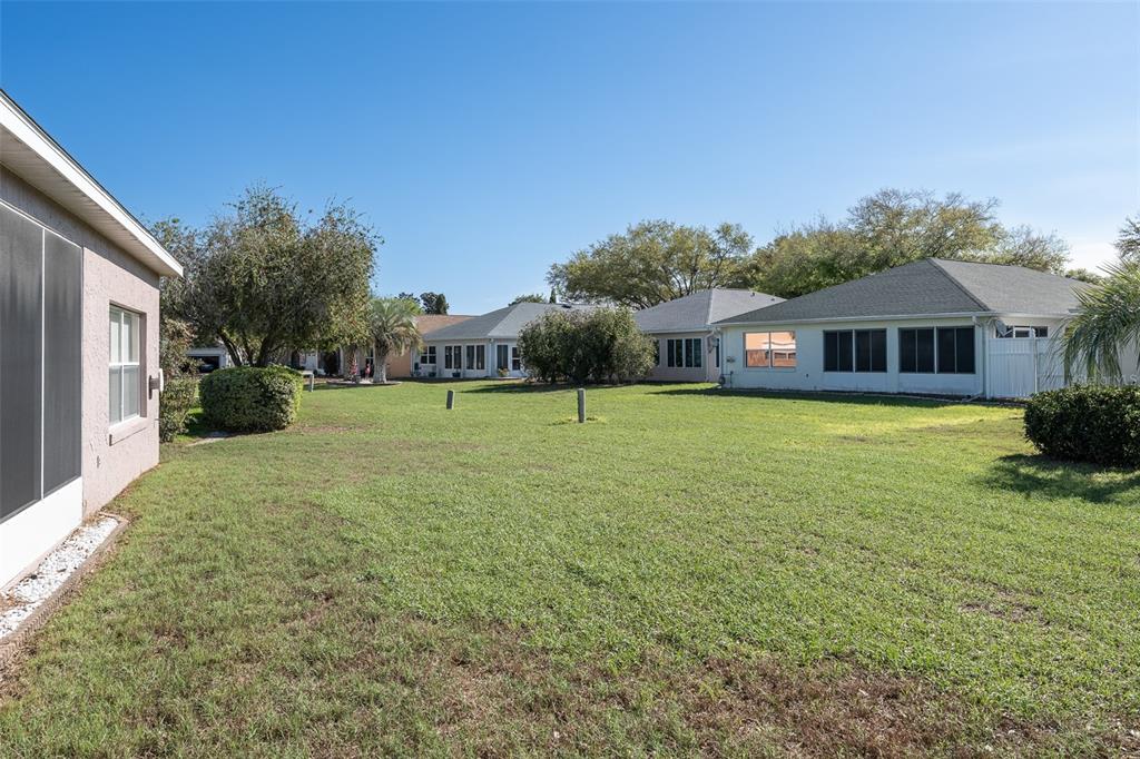 9077 Southwest 95th Terrace Ocala, FL 34481 - Photo 41 of 45 a view of a house with a yard