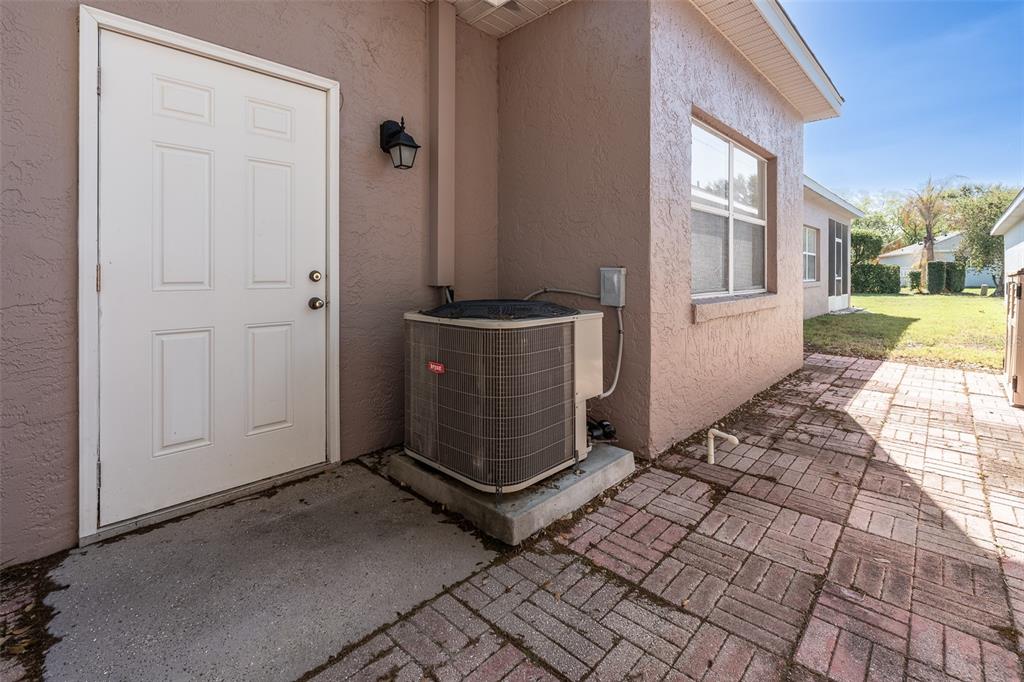 9077 Southwest 95th Terrace Ocala, FL 34481 - Photo 44 of 45 a view of a porch with a door