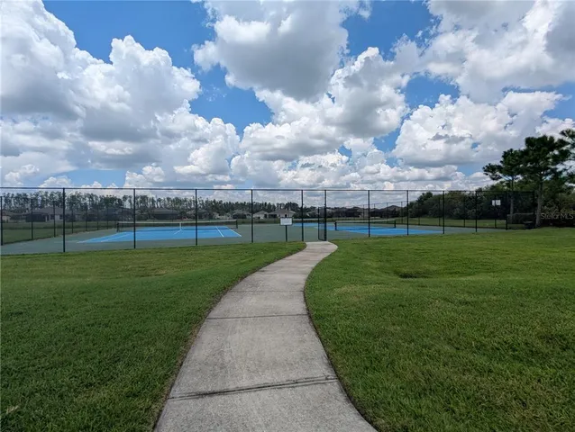 a view of a golf course with a garden