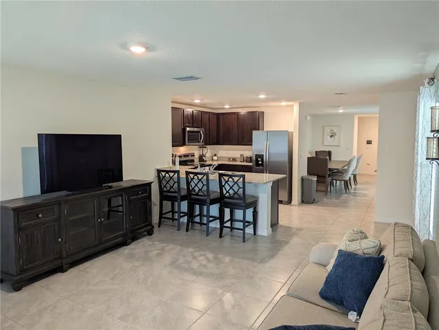 a view of a dining room with furniture