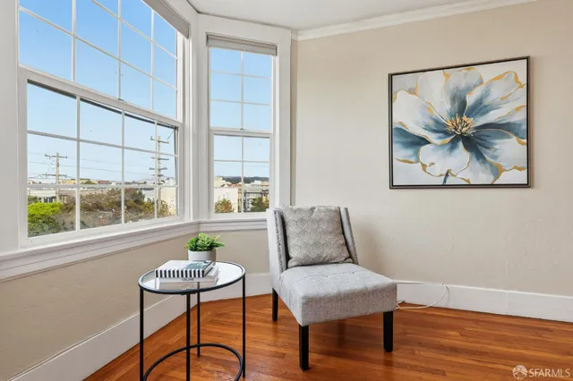 a view of a livingroom with furniture and window