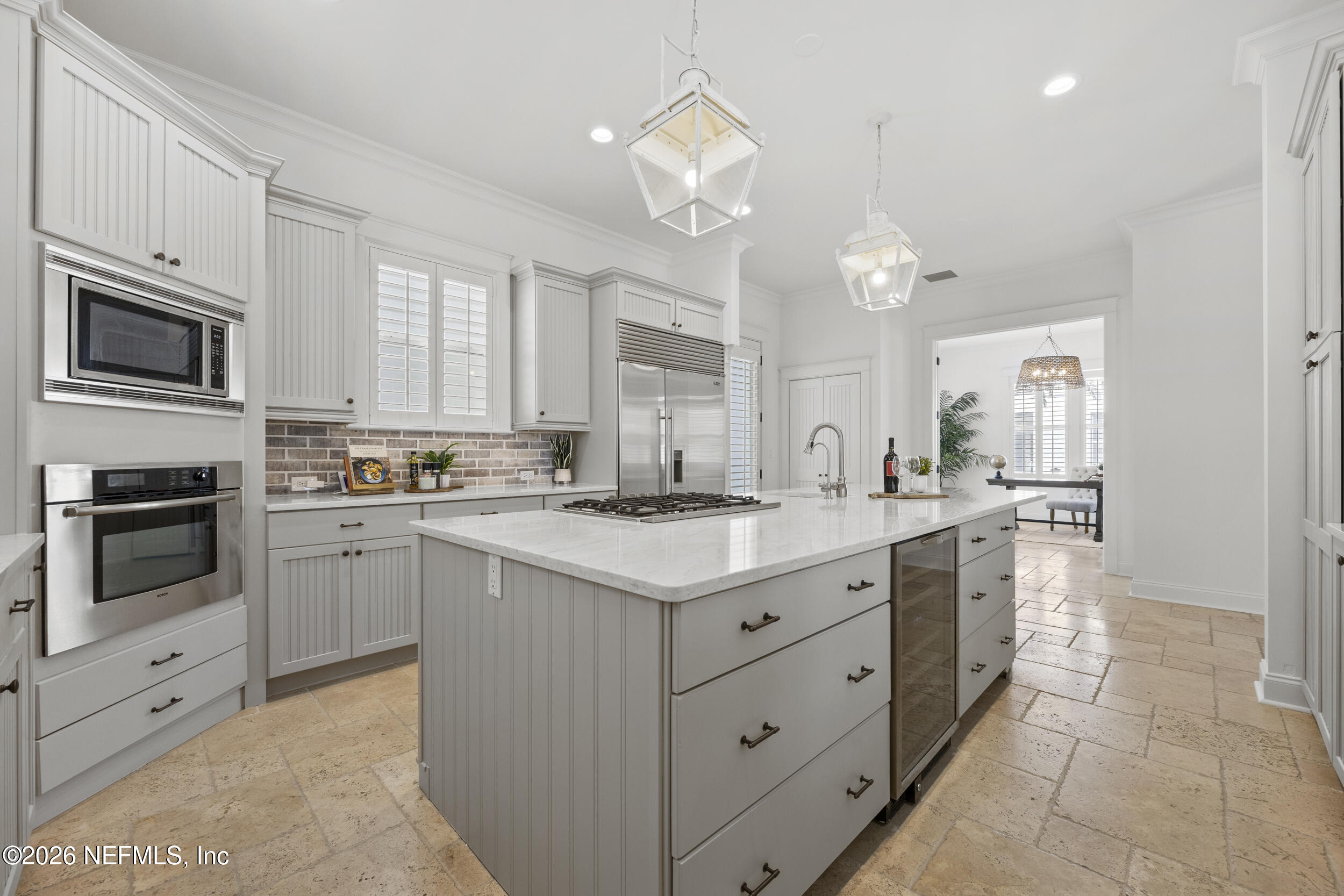 2912 Abaco Lane Jacksonville Beach, FL 32250 - Photo 18 of 46 a kitchen with a sink stove and microwave