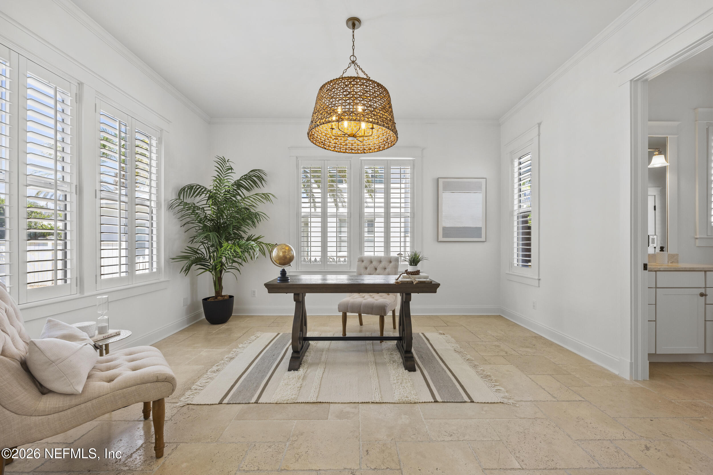 2912 Abaco Lane Jacksonville Beach, FL 32250 - Photo 20 of 46 a living room with furniture a window and a chandelier