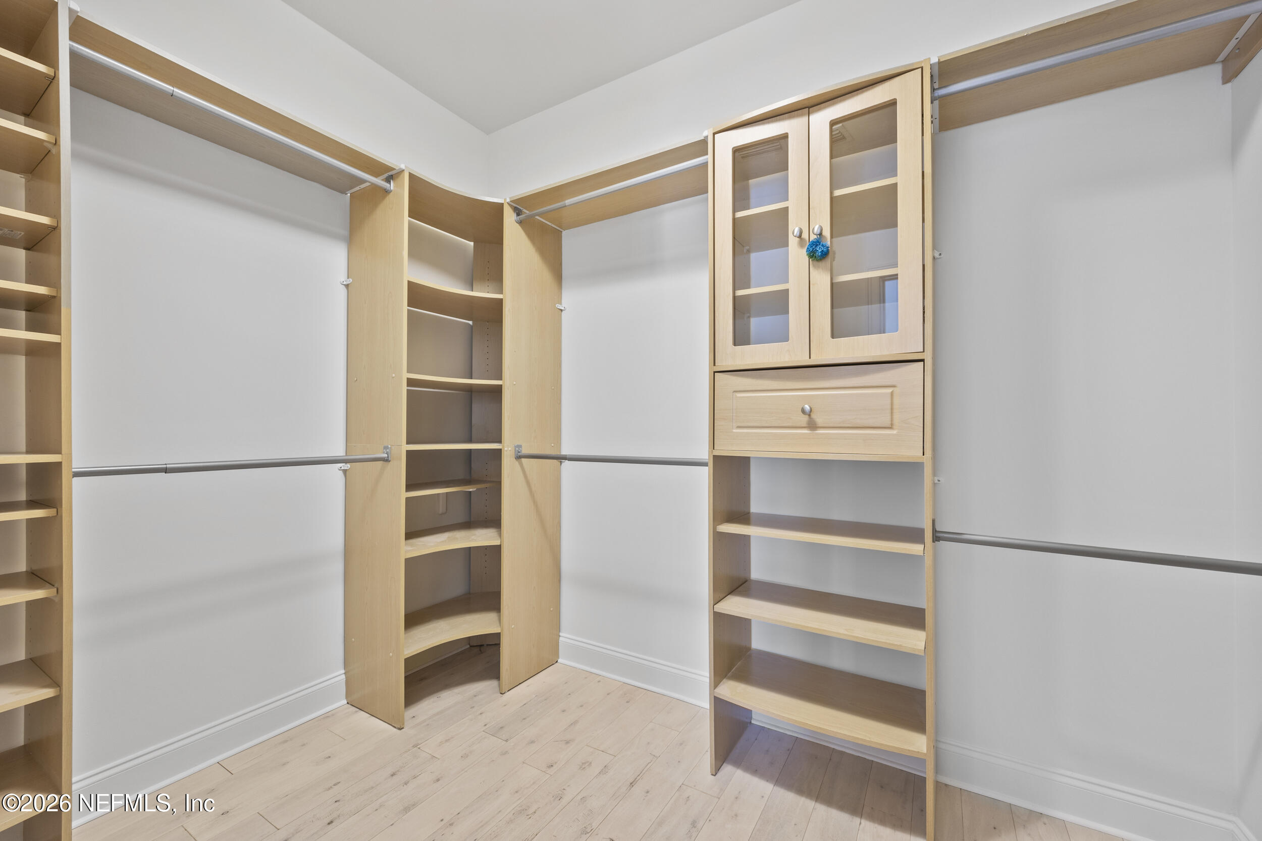2912 Abaco Lane Jacksonville Beach, FL 32250 - Photo 27 of 46 a view of walk in closet with empty racks