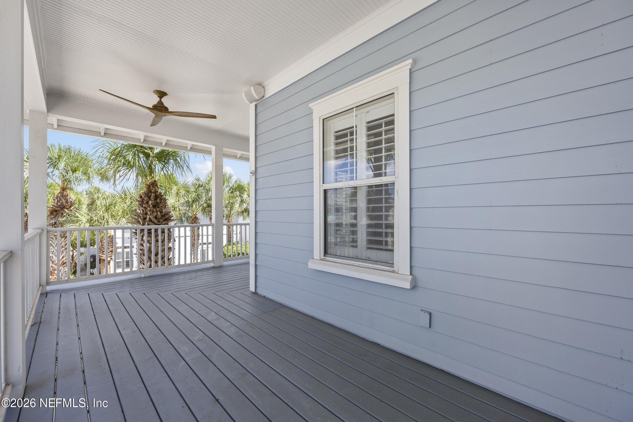 2912 Abaco Lane Jacksonville Beach, FL 32250 - Photo 38 of 46 an empty room with wooden floor and windows