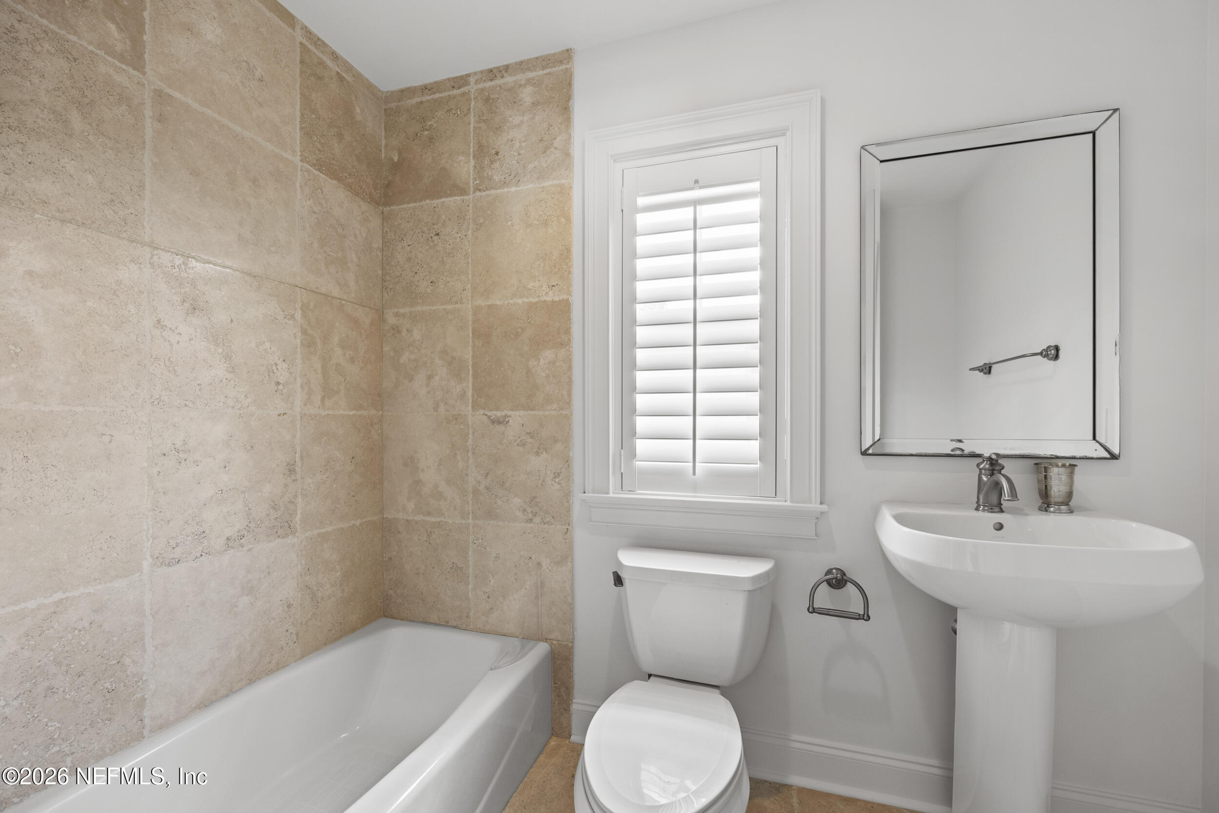 2912 Abaco Lane Jacksonville Beach, FL 32250 - Photo 41 of 46 a bathroom with a sink a toilet and shower