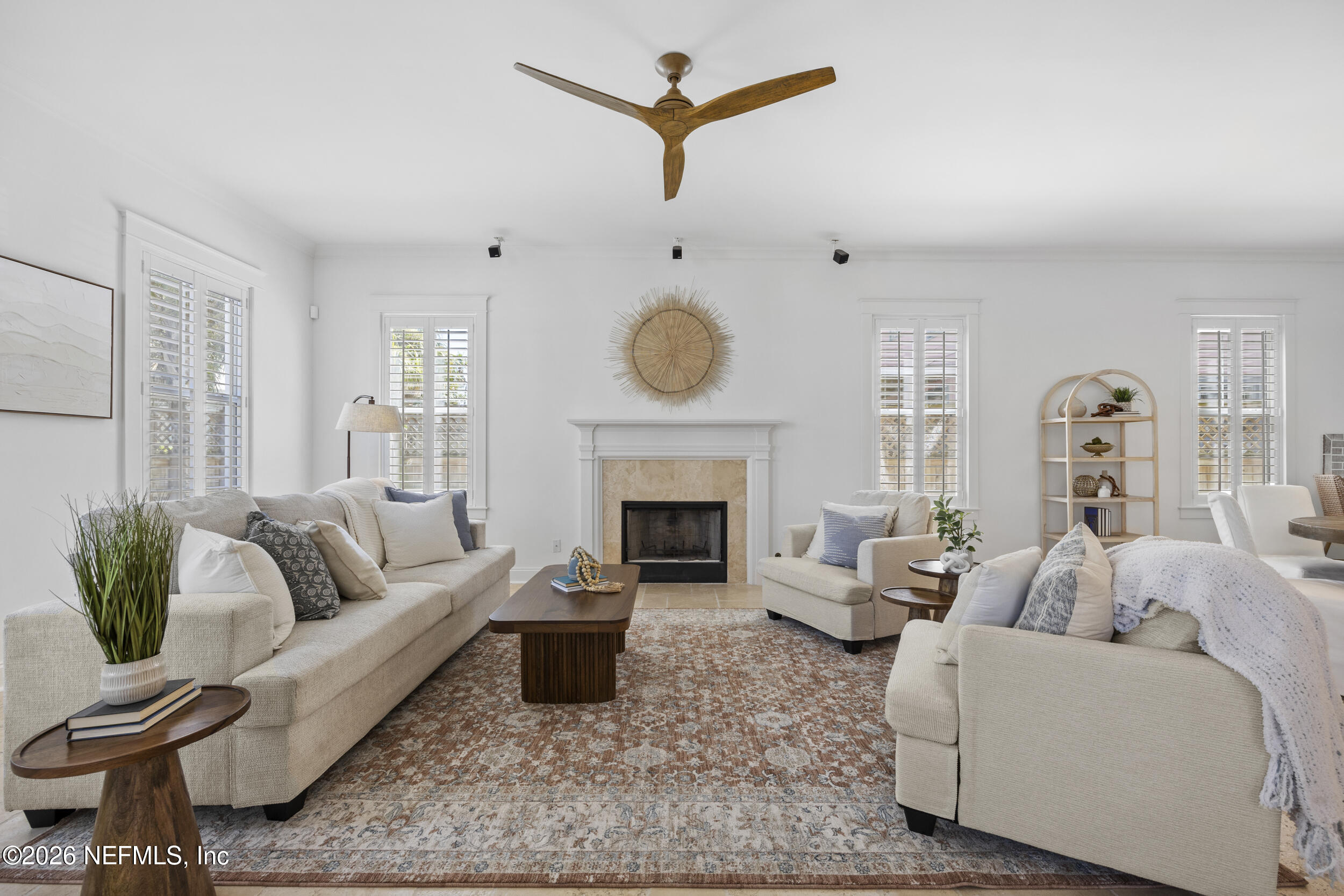 2912 Abaco Lane Jacksonville Beach, FL 32250 - Photo 5 of 46 a living room with furniture and a fireplace