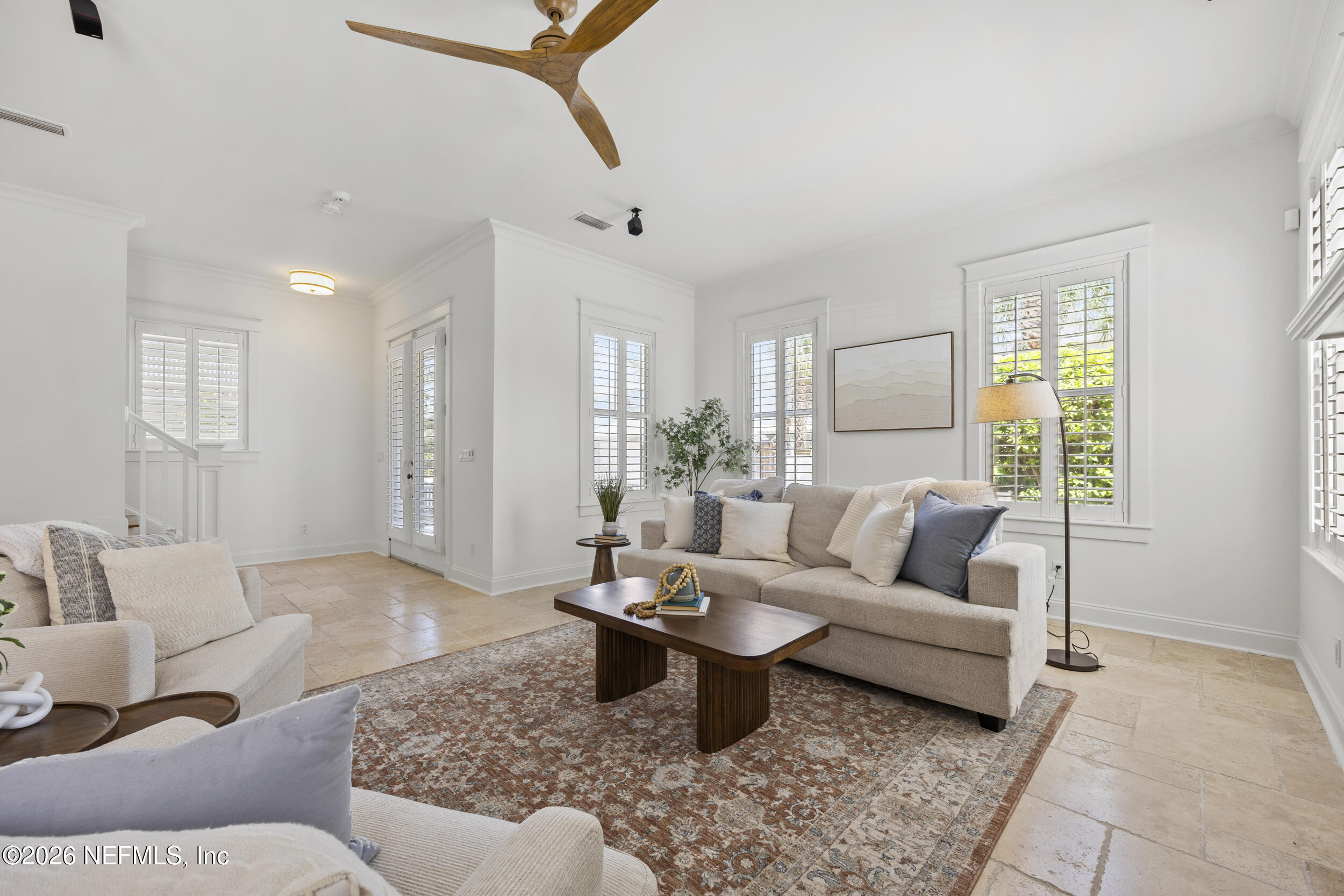2912 Abaco Lane Jacksonville Beach, FL 32250 - Photo 8 of 46 a living room with furniture and a rug