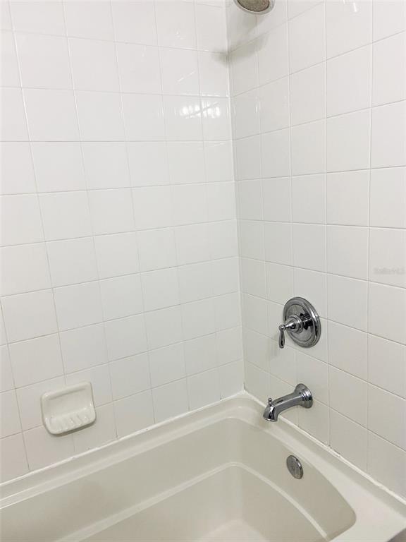 8946 White Sage Loop Lakewood Ranch, FL 34202 - Photo 22 of 36 a bathroom with a bathtub