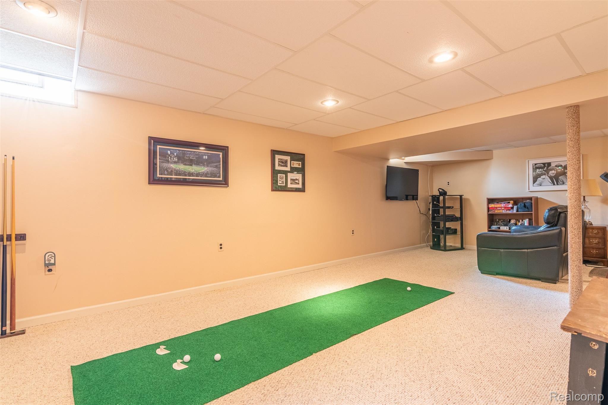 351 Silvervale Drive Rochester, MI 48309 - Photo 42 of 49 Large basement rec room