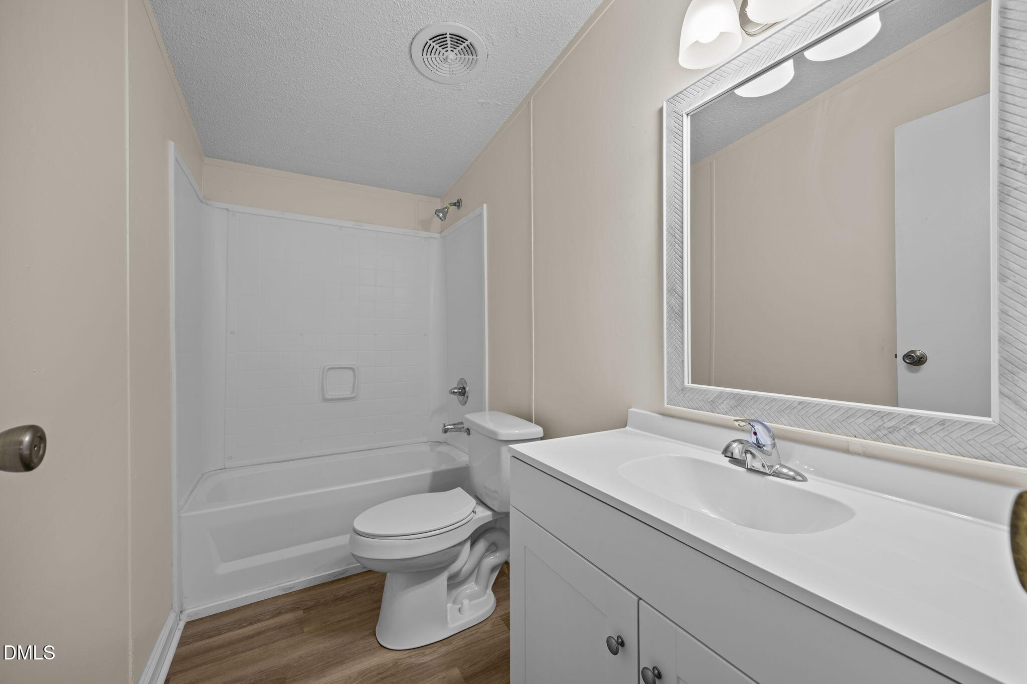 91 Pine Ridge Road Henderson, NC 27537 - Photo 33 of 50 a bathroom with a sink a toilet and shower