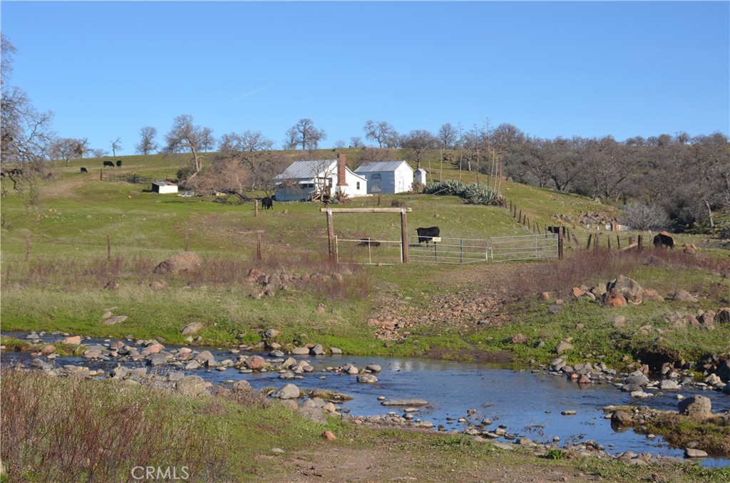 0 Tuscan Springs Road Red Bluff, CA 96080 - Photo 12 of 23 a view of a town with mountains in the background